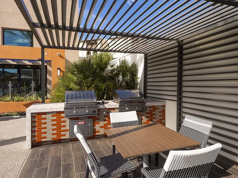 Elevate your outdoor gatherings with our fully equipped outdoor kitchen, perfect for cooking and entertaining.