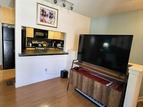Living Room, Kitchen and Upper Stairs