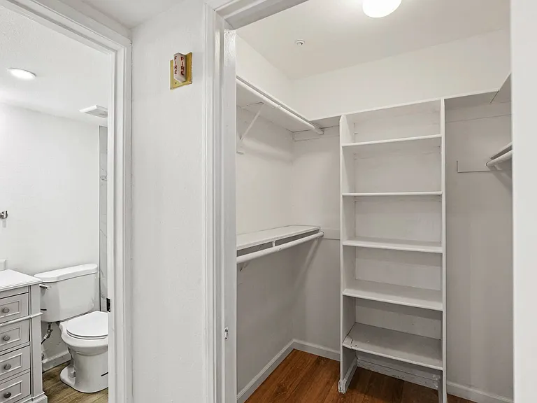 Bedroom with Walk-In Closet and Bathroom