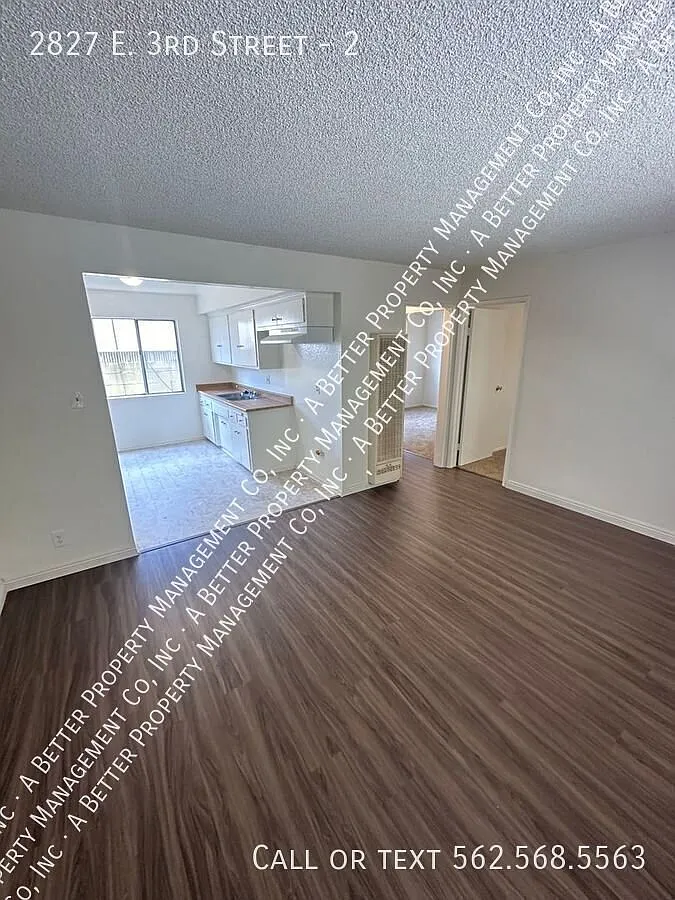 GATED Lower 2 Bedroom w/New Paint, Plank Floors & Carpet. Onsite Laundry — Photo 1