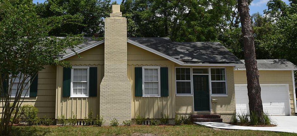 Paved sidewalk + 3 car driveway + 2 car garage + new roof