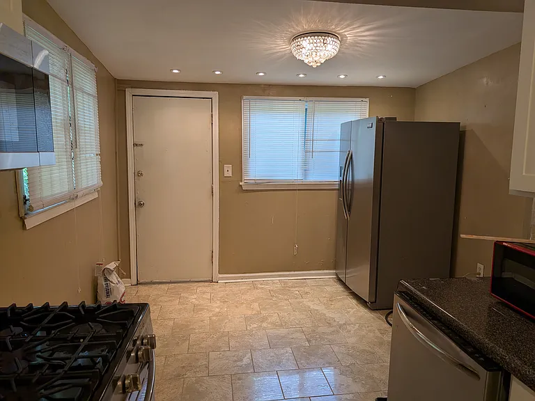 Additional Kitchen Space with Recessed and Modern Lighting.