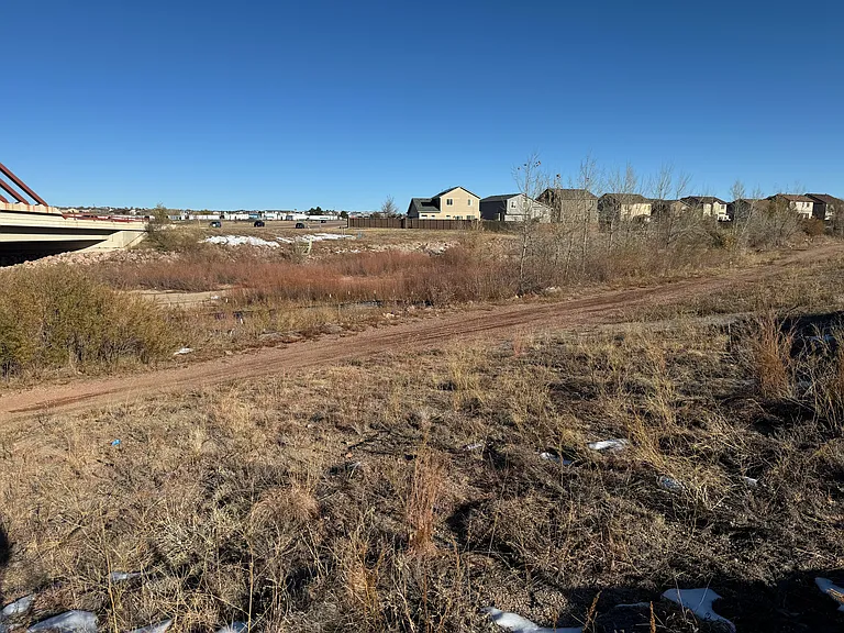 Adjacent to open space and tails