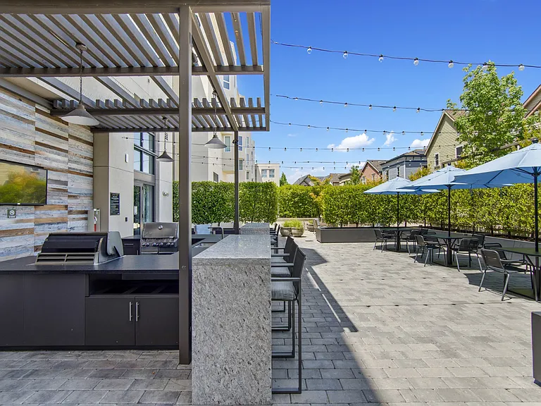 Outdoor Patio with Grill and Seating at Aventine Apartments in Hercules, CA 94547
