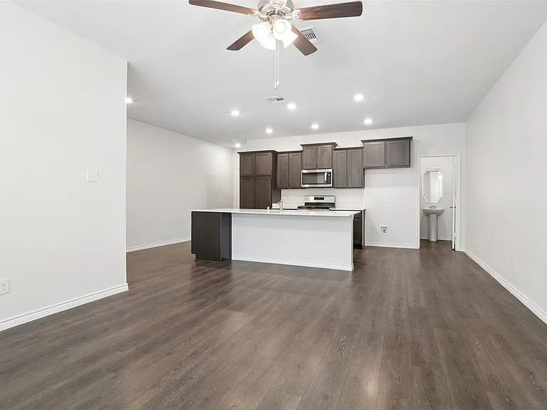 Open floor plan looking into the kitcchen with a large eat at island