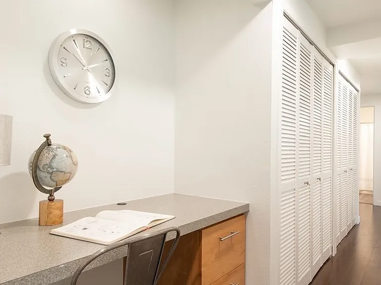 Two large closets- the first one is configured for clothes and storage and the second holds the washer / dryer, water heater and plenty of storage racks for cleaning supplies and more