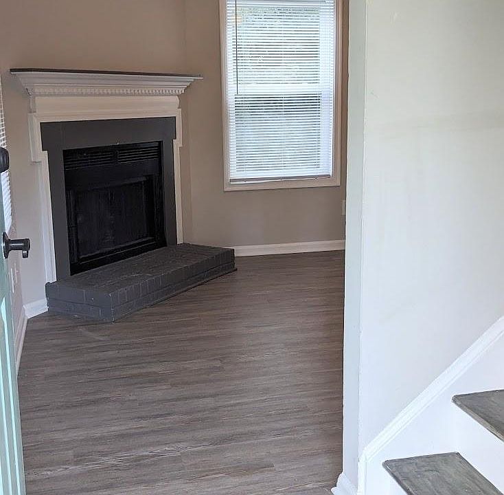 Walking in you are greeted by a log burning fireplace