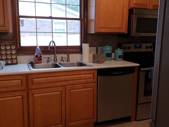 All new kitchen with Quartz countertops and stainless steel 