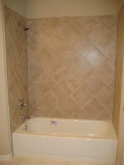 New tiled shower and tub in master