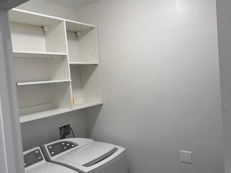 Separate Laundry Room with Washer and Dryer, plenty of storage space