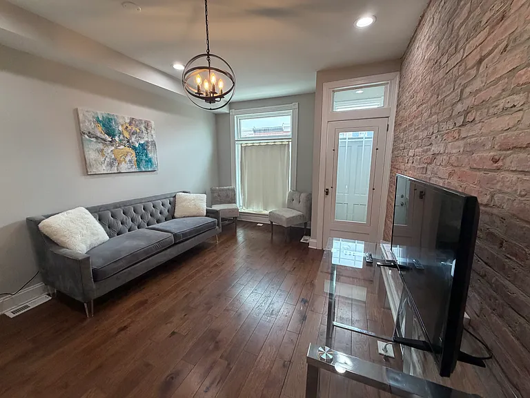 Fully furnished living area and desk for studies