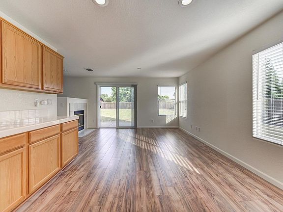 Kitchen and sliding door to backyard.