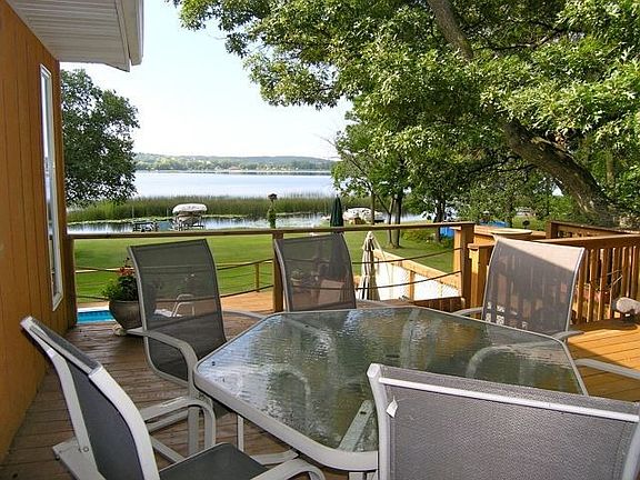 Upper deck overlooking the lake and pool