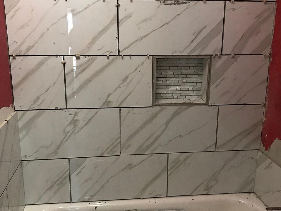 Bath being tiled