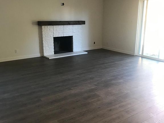 Living room opens to kitchen, perfect for entertaining