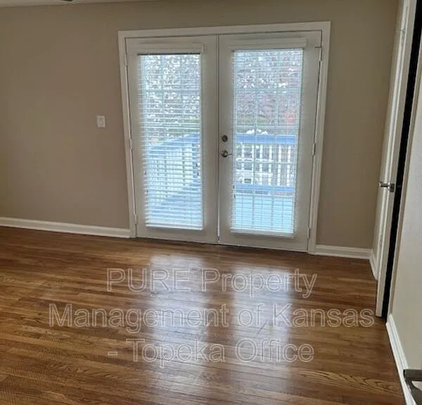 429 E 63rd Ter — Photo 20