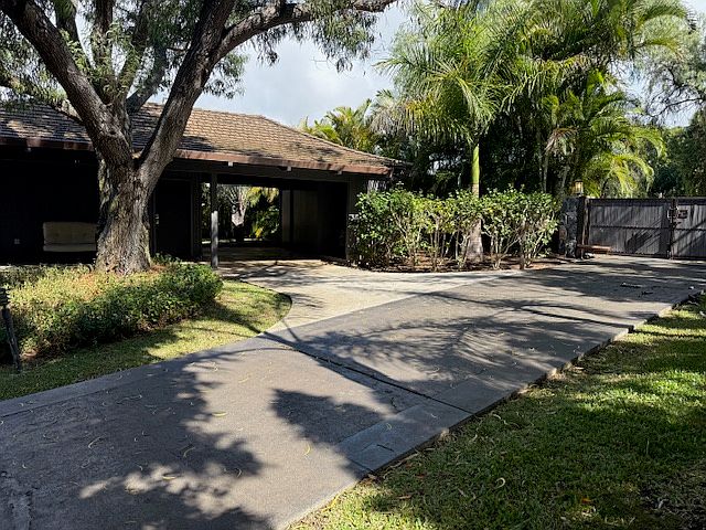 Gated entrance to the two-acre property.