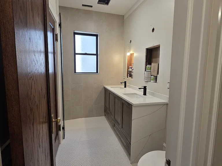Hall bath with double sink, dual medicine cabinets (coming)