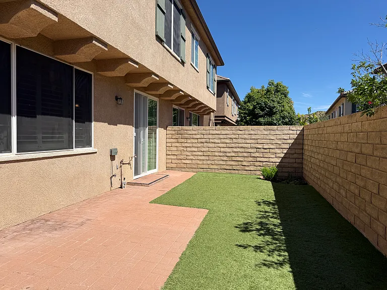 Patio with nice turf and tiles