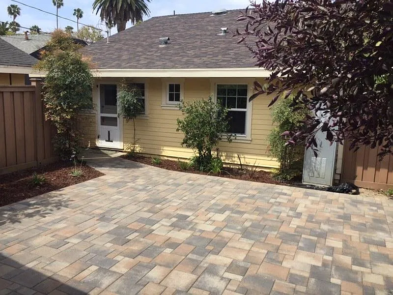 Backyard - Private landscaped yard with custom pavers
