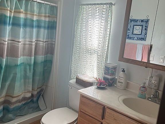 View of M/B. Walk-in shower.