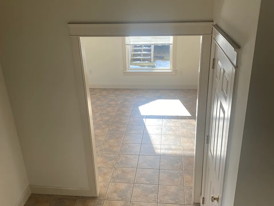 Large entry way with coat closet