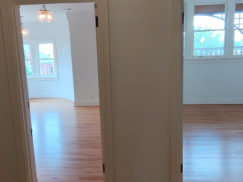 View coming through the apartment door showing the NE & SE bedroom doors.