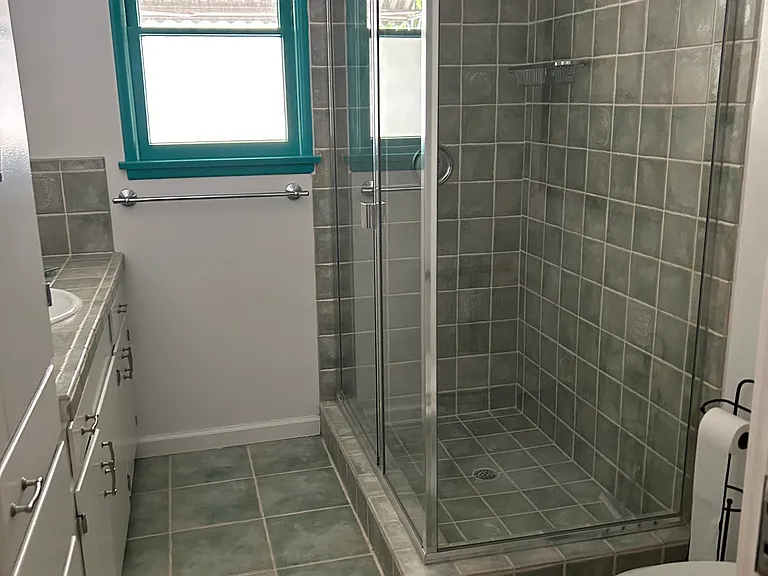 Second bathroom with tons of storage.