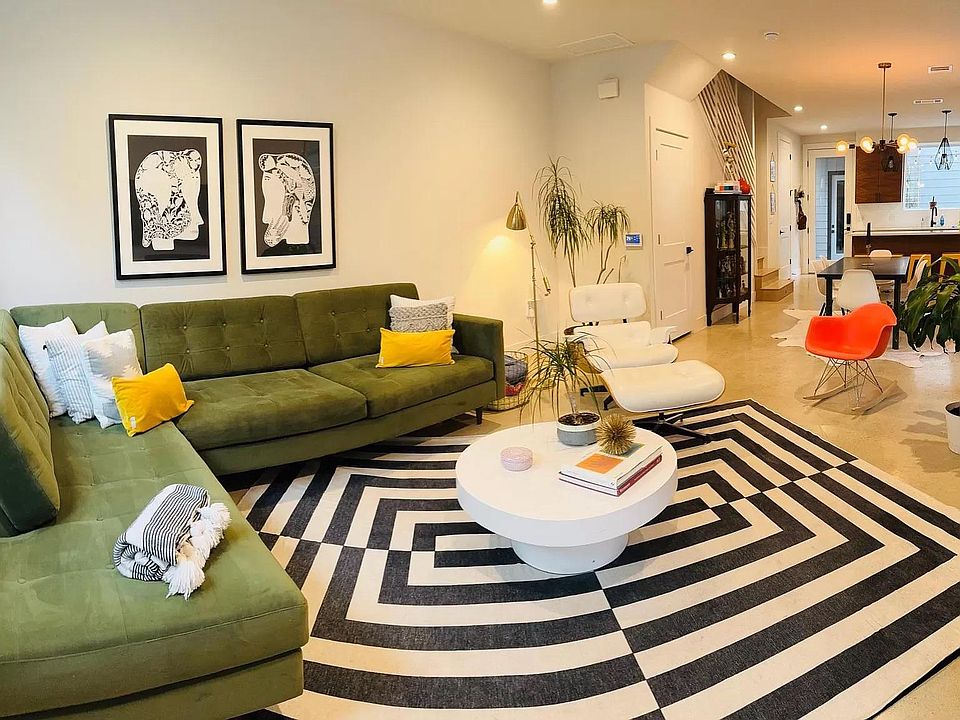 Cozy welcoming and beautifully decorated living area invites the guests into the home.