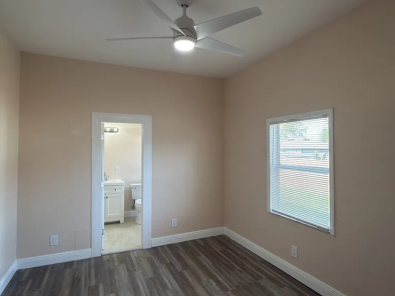 Primary Bedroom facing bathroom