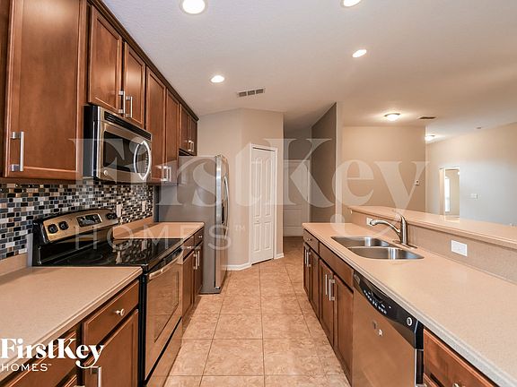 5th image of 6395 Rolling Tree St