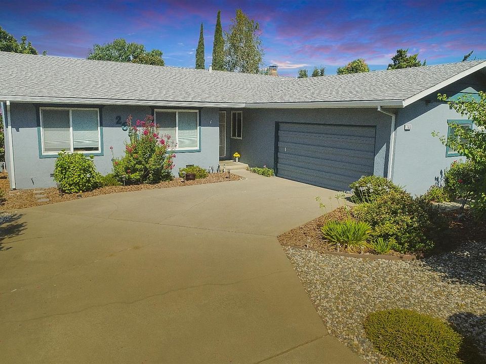 Sitting on nearly a quarter acre, this lovely home boasts a corner lot, long driveway and gorgeous landscaping.