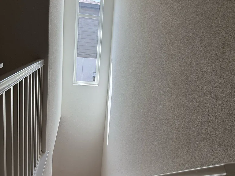 Stairs between 2nd and 3rd floor, natural light and high ceiling