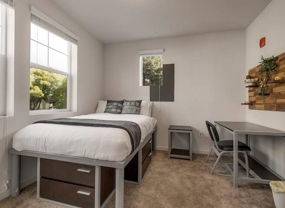 Have a good night's rest! This room has a full-size bed with a desk and chair.