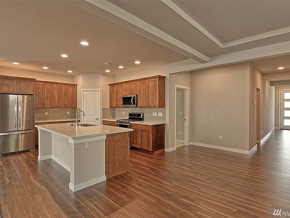 Photos are of The Hampshire floor plan and are for illustration purposes only to reflect typical finishes.  May depict seller enhancements.  Colors and options may vary.