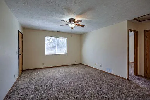 Living room and hallway at Gretna Oaks.