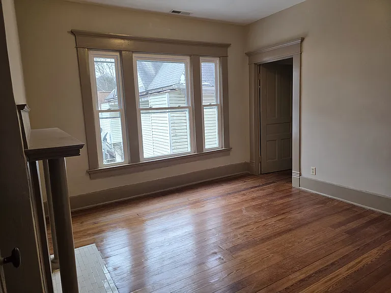 From the doorway of bedroom 2 with walk-in closet on the right.