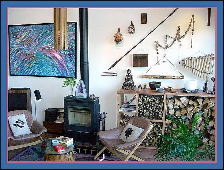 Danish modern super efficient Wood-stove and firewood storage in the Great Room - with tongue and groove pine cathedral wood ceiling and skylights on Levels 3 & 4, Main Bedroom and bath.