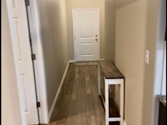 Looking down hall toward front door