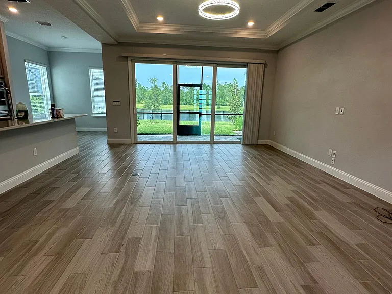 This is the living room area noticed the view and the lanai_