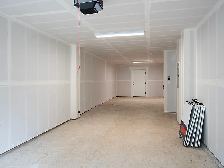 2 car garage with large storage/shop