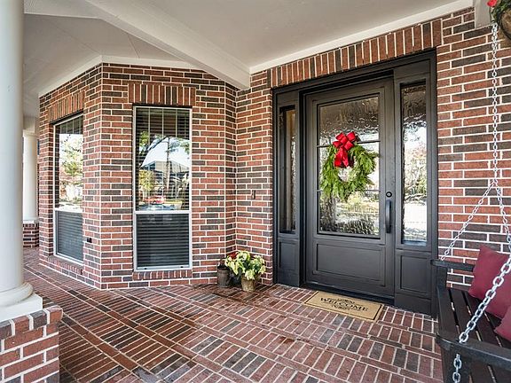 This gorgeous entry iron door was just installed in September.