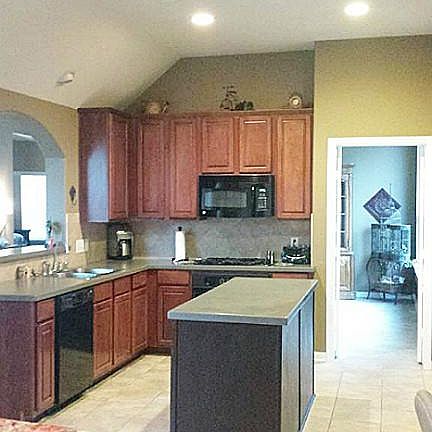 Huge custom painted island kitchen with & recessed can lighting