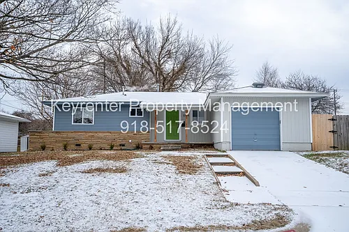 5704 E 30th Pl Photo 1