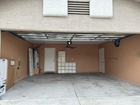 Two-car garage. 20A/240V receptacle on right wall.
