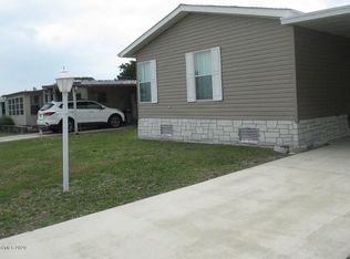 1027 Barefoot Cir, Barefoot Bay, FL 32976