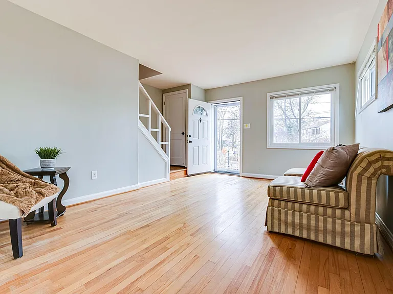 Hardwood floors now stained a darker color