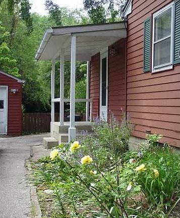 side yard with herb garden