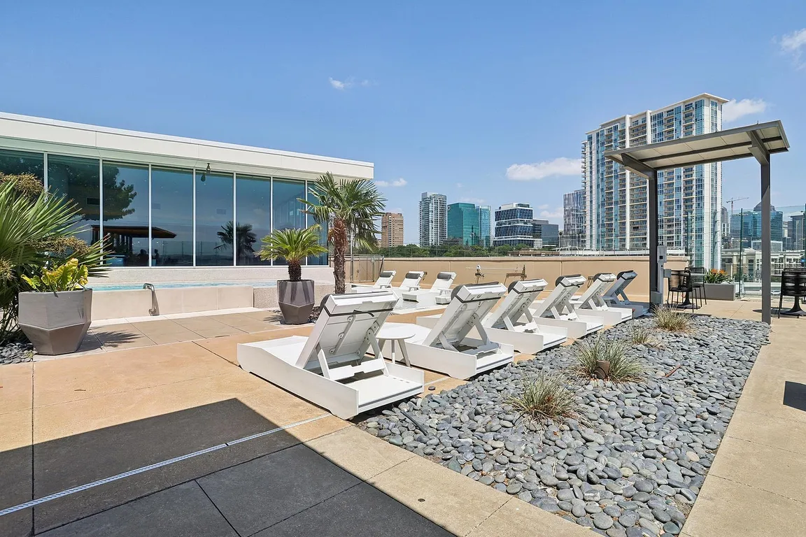 Luxurious Pool Deck with Skyline Views
