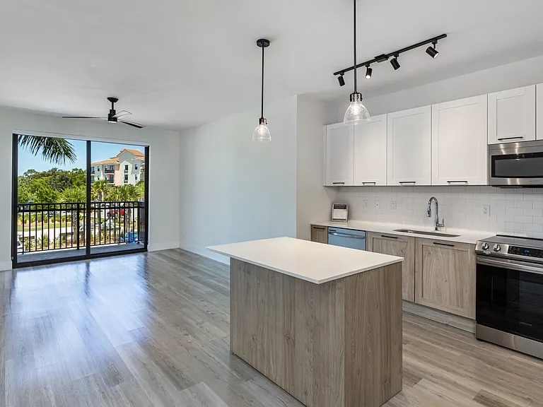 Spacious kitchen that opens up to the living room